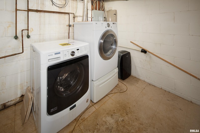 1427 35th Ave, Rock Island, IL 61201 - washroom featuring washer and dryer, concrete block wall, and electric panel