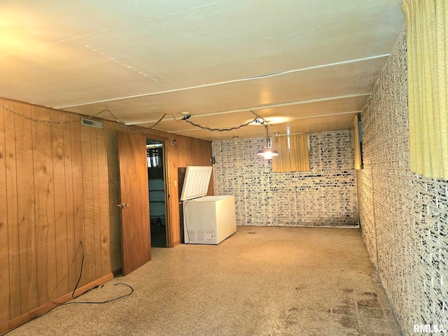 509 W 9th St, Tipton, IA 52772 - finished below grade area with wooden walls and refrigerator