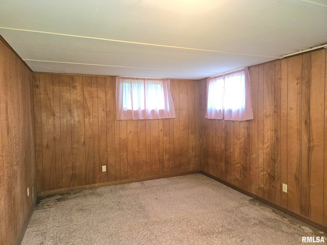 509 W 9th St, Tipton, IA 52772 - unfurnished room featuring wooden walls and carpet floors
