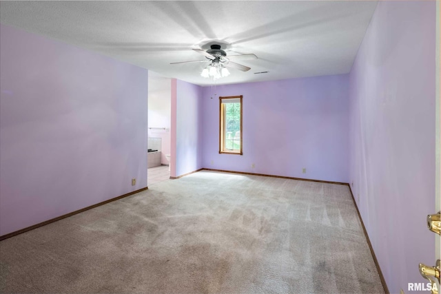 10415 Chayla Rd, Marion, IL 62959 - carpeted spare room with ceiling fan and baseboards