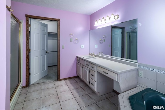 10415 Chayla Rd, Marion, IL 62959 - full bathroom with vanity, a stall shower, tile patterned floors, and a tub to relax in