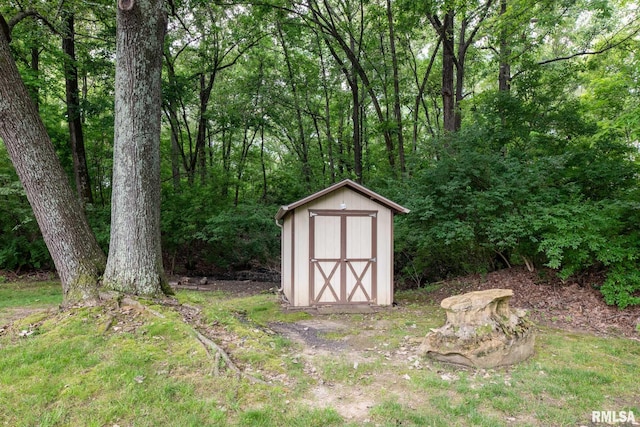 10415 Chayla Rd, Marion, IL 62959 - view of shed with a wooded view