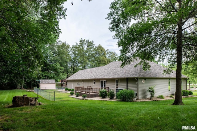 10415 Chayla Rd, Marion, IL 62959 - back of property featuring roof with shingles and a wooden deck