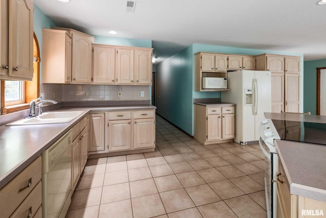 10415 Chayla Rd, Marion, IL 62959 - kitchen featuring white appliances, light brown cabinetry, tasteful backsplash, light tile patterned floors, and recessed lighting