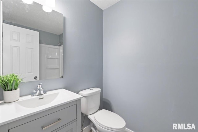 3518 W Garfield St, Davenport, IA 52804 - bathroom with vanity, a textured ceiling, and a shower