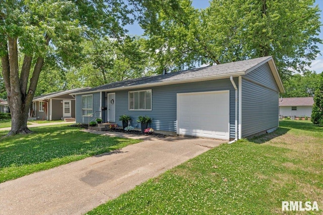 3518 W Garfield St, Davenport, IA 52804 - ranch-style home featuring concrete driveway, a front yard, and a garage