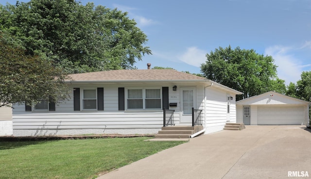 3536 W Hayes St, Davenport, IA 52804 - view of front facade featuring an outbuilding, a garage, a front yard, and roof with shingles