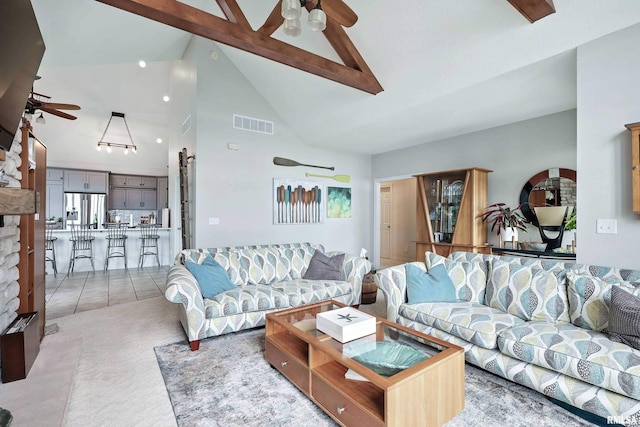21945 Great River Rd, Le Claire, IA 52753 - living room with ceiling fan, high vaulted ceiling, light colored carpet, and beamed ceiling