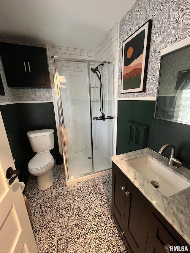 224 S Henderson St, Toulon, IL 61483 - full bathroom featuring wallpapered walls, vanity, and a shower stall