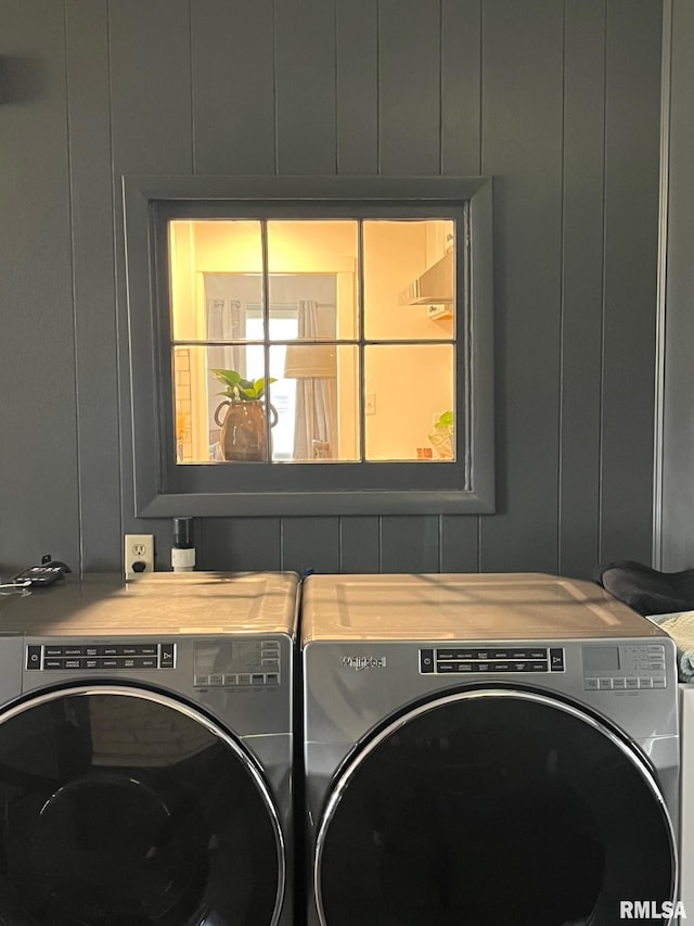 224 S Henderson St, Toulon, IL 61483 - laundry room featuring separate washer and dryer and a decorative wall
