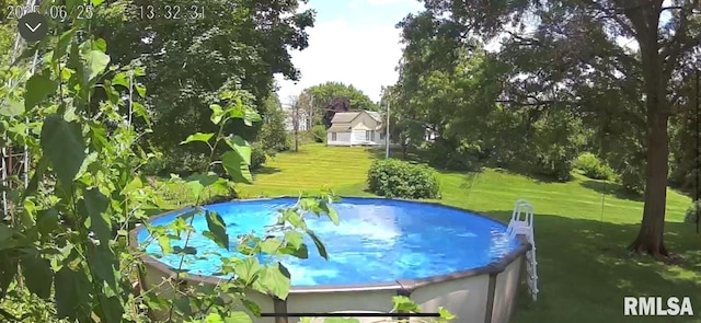 224 S Henderson St, Toulon, IL 61483 - view of pool with a lawn