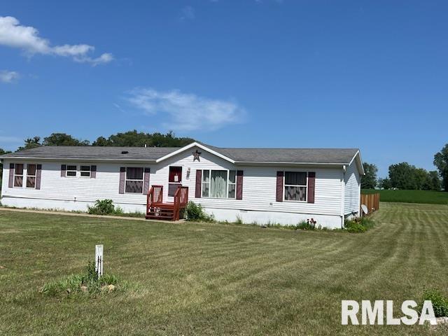 911 4th St, New Boston, IL 61272 - manufactured / mobile home featuring a front lawn