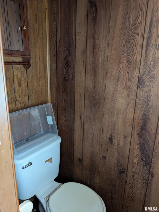 1507 N Lincoln Ave, Davenport, IA 52804 - bathroom with wood walls and toilet