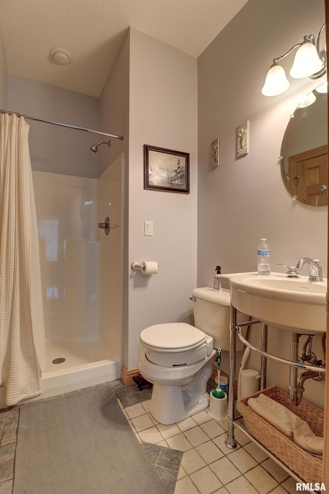 4581 180th St, Clinton, IA 52732 - full bathroom featuring a shower with shower curtain and tile patterned floors