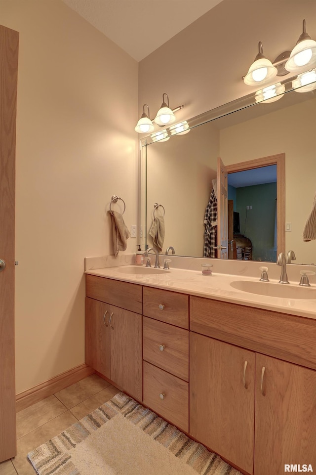 4581 180th St, Clinton, IA 52732 - bathroom with tile patterned floors and double vanity