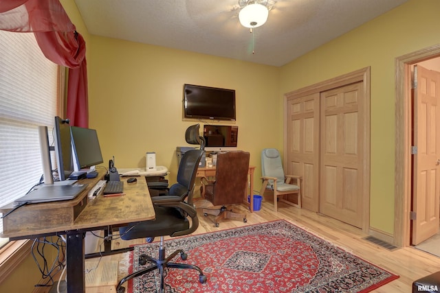 4581 180th St, Clinton, IA 52732 - office area featuring wood finished floors and ceiling fan