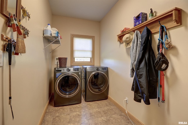 4581 180th St, Clinton, IA 52732 - washroom with washing machine and dryer and baseboards