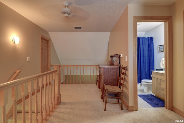 4581 180th St, Clinton, IA 52732 - hall featuring carpet, an upstairs landing, and lofted ceiling