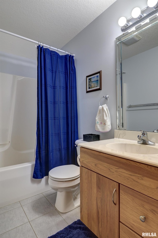 4581 180th St, Clinton, IA 52732 - full bath featuring tile patterned flooring, vanity, shower / bath combo, and a textured ceiling