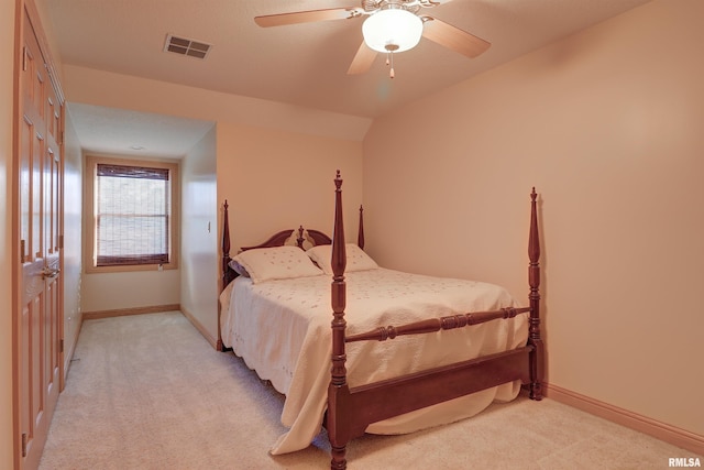 4581 180th St, Clinton, IA 52732 - bedroom with light colored carpet and a ceiling fan