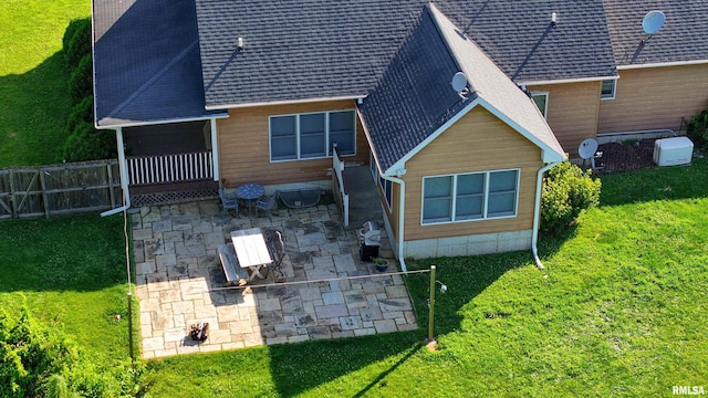 4581 180th St, Clinton, IA 52732 - rear view of house featuring a patio and roof with shingles