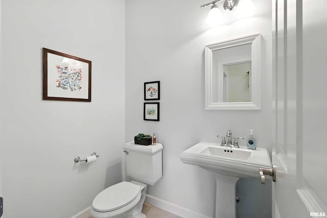 905 Bridgeview Place, Le Claire, IA 52753 - half bathroom featuring toilet and tile patterned floors
