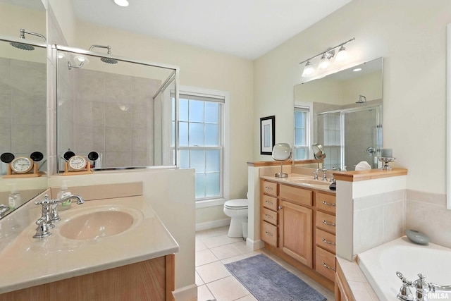 905 Bridgeview Place, Le Claire, IA 52753 - bathroom with a stall shower, tile patterned flooring, a garden tub, and two vanities