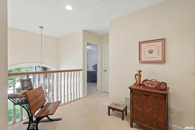905 Bridgeview Place, Le Claire, IA 52753 - hallway featuring carpet floors and baseboards