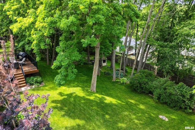 905 Bridgeview Place, Le Claire, IA 52753 - view of yard featuring a wooden deck and stairway