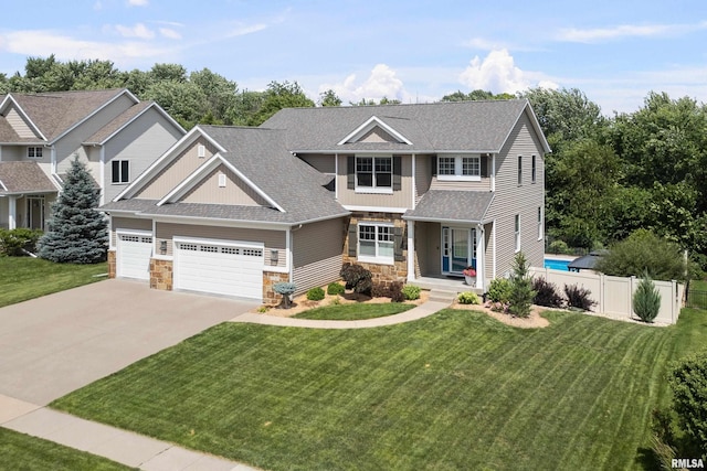 5727 Charlie Chase Ln, Bettendorf, IA 52722 - craftsman inspired home featuring stone siding, driveway, a shingled roof, a garage, and board and batten siding
