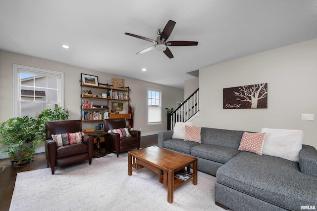 5727 Charlie Chase Ln, Bettendorf, IA 52722 - living room featuring light wood-type flooring, ceiling fan, stairway, and recessed lighting