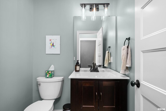 5727 Charlie Chase Ln, Bettendorf, IA 52722 - half bathroom featuring toilet and vanity