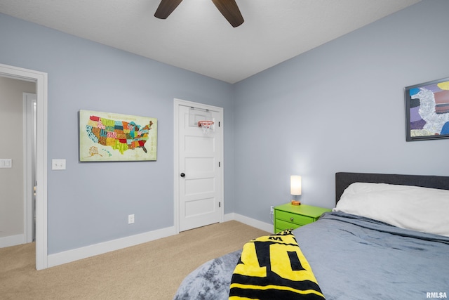 5727 Charlie Chase Ln, Bettendorf, IA 52722 - bedroom featuring carpet and ceiling fan