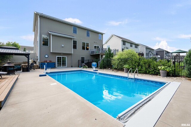 5727 Charlie Chase Ln, Bettendorf, IA 52722 - view of swimming pool featuring a gazebo, a residential view, and a patio area