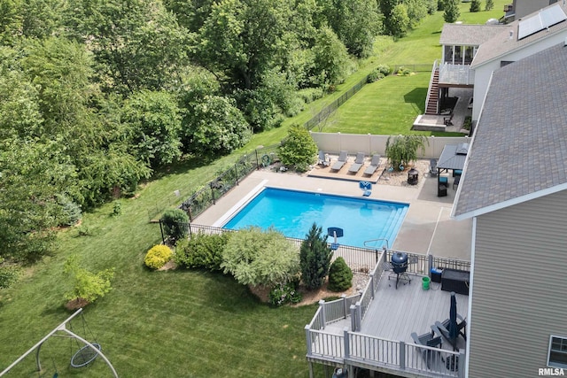 5727 Charlie Chase Ln, Bettendorf, IA 52722 - view of pool with a wooden deck, a fenced backyard, a patio area, and outdoor dining space