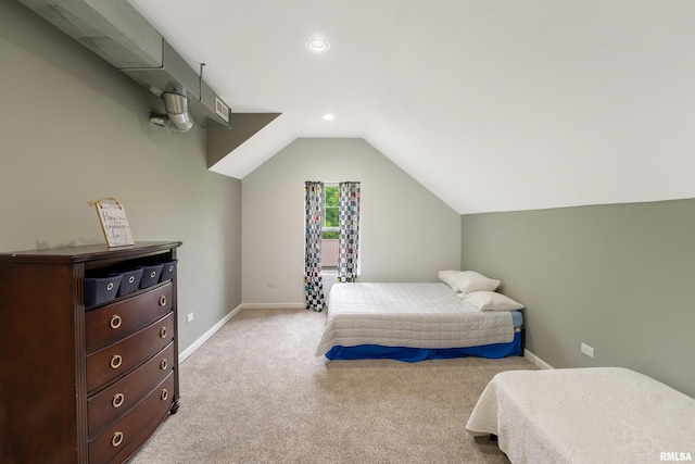 183 Island Ave, East Moline, IL 61244 - bedroom featuring vaulted ceiling, light colored carpet, and recessed lighting