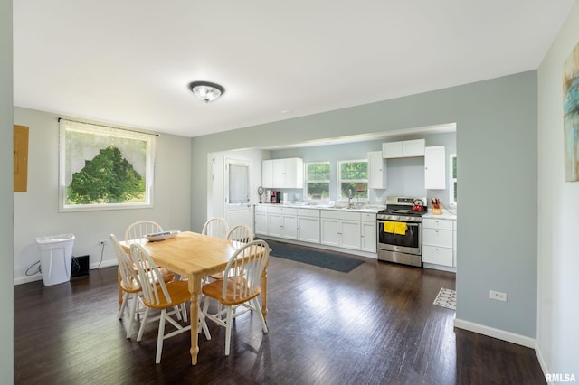 183 Island Ave, East Moline, IL 61244 - dining room featuring dark wood finished floors and baseboards