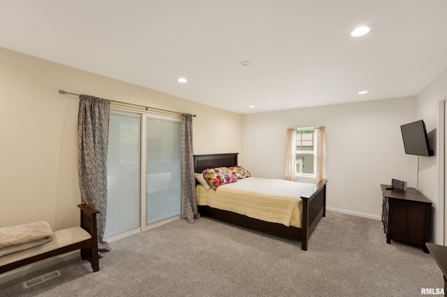 183 Island Ave, East Moline, IL 61244 - carpeted bedroom with recessed lighting and access to outside