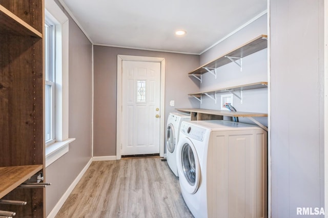 1808 E 12th St, Davenport, IA 52803 - laundry room featuring washing machine and dryer, light wood-style flooring, ornamental molding, healthy amount of natural light, and recessed lighting