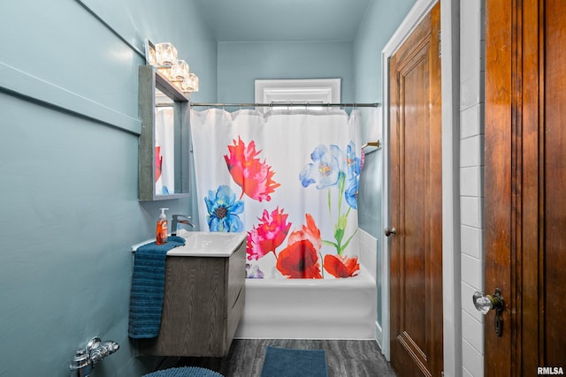 1632 18th Ave Unit 6, Rock Island, IL 61201 - full bathroom featuring shower / bath combo with shower curtain, vanity, and wood finished floors