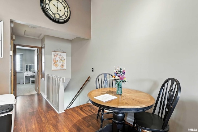 4011 Lillie Ave Unit 106, Davenport, IA 52806 - dining space featuring wood finished floors and attic access