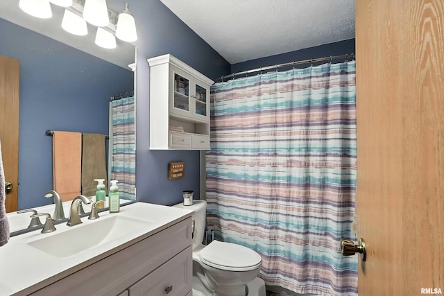 4011 Lillie Ave Unit 106, Davenport, IA 52806 - full bath with vanity, a textured ceiling, and a shower with curtain