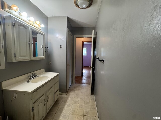 2938 Summit Hills Ct, Bettendorf, IA 52722 - bathroom with vanity and tile patterned floors