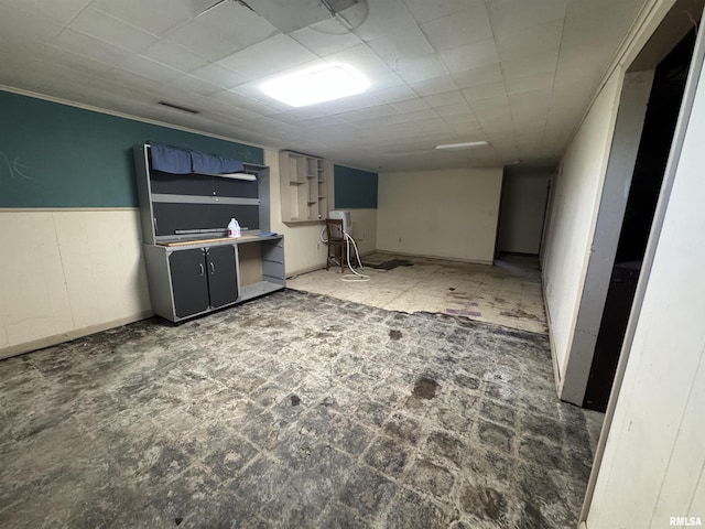 2938 Summit Hills Ct, Bettendorf, IA 52722 - finished basement featuring a wainscoted wall