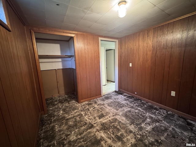 2938 Summit Hills Ct, Bettendorf, IA 52722 - unfurnished bedroom with wood walls