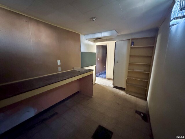 2938 Summit Hills Ct, Bettendorf, IA 52722 - finished basement with tile patterned floors