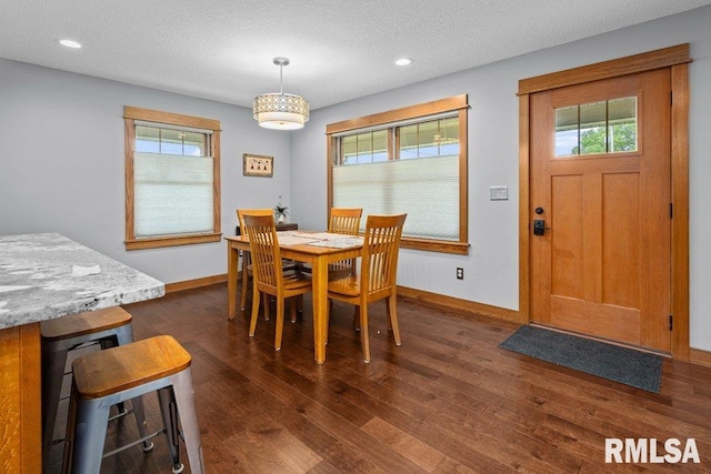 11815 Rte 84 N, Port Byron, IL 61275 - dining space featuring healthy amount of natural light, dark wood finished floors, a textured ceiling, and recessed lighting