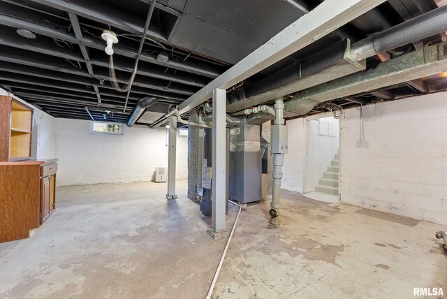 209 45th St, Moline, IL 61265 - basement with stairway and heating unit