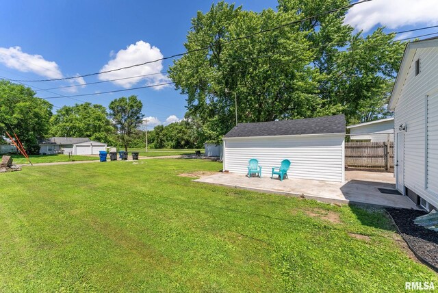 209 45th St, Moline, IL 61265 - view of yard featuring a patio area and an outdoor structure