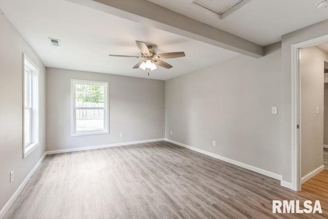 1231 Devils Glen Rd, Bettendorf, IA 52722 - unfurnished room featuring wood finished floors and ceiling fan